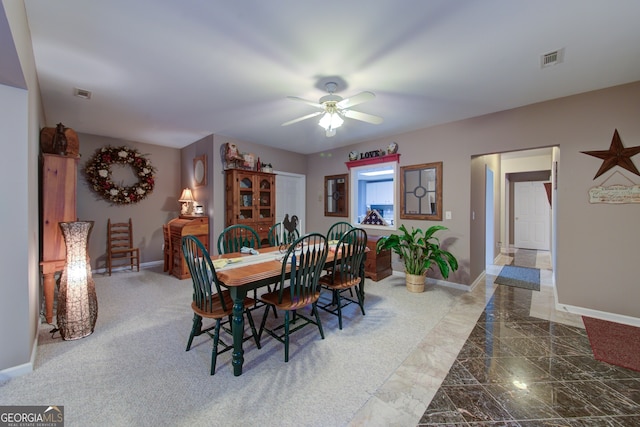 219 John Garner Rd, Dahlonega, GA 30533 - dining space with ceiling fan and marble tiled flooring