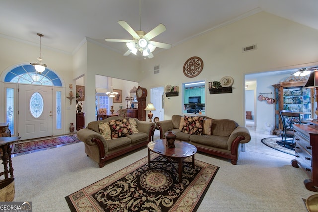 219 John Garner Rd, Dahlonega, GA 30533 - carpeted living area featuring high vaulted ceiling, a ceiling fan, and crown molding