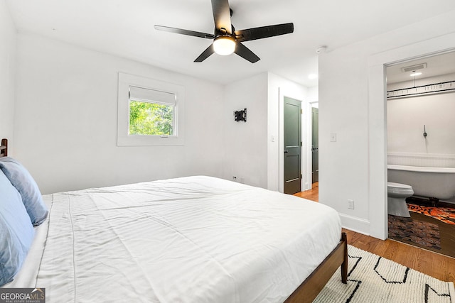 216 Leyden St, Decatur, GA 30030 - bedroom with wood finished floors, ensuite bathroom, and a ceiling fan