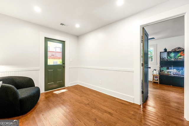 216 Leyden St, Decatur, GA 30030 - foyer with wood finished floors, a wainscoted wall, and recessed lighting