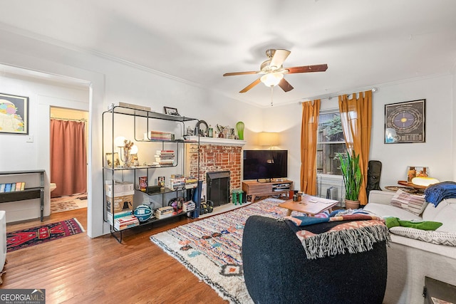 216 Leyden St, Decatur, GA 30030 - living room featuring ceiling fan, wood finished floors, and crown molding