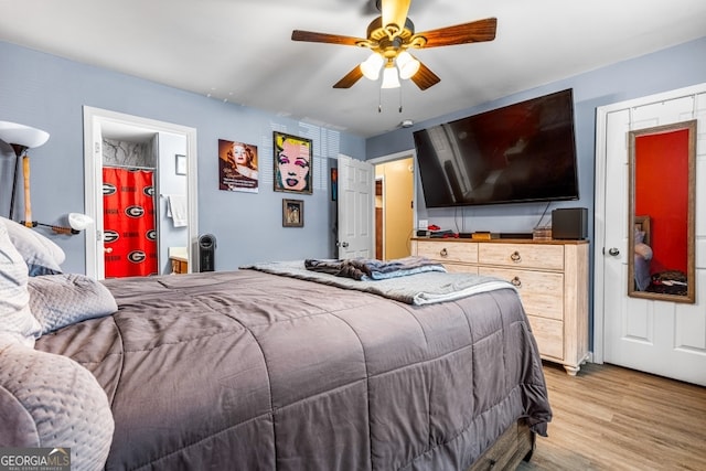 281 Northwinds Blvd Unit D-3, Carrollton, GA 30197 - bedroom featuring light wood finished floors and a ceiling fan
