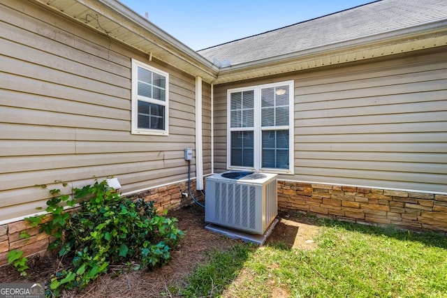 281 Northwinds Blvd Unit D-3, Carrollton, GA 30197 - exterior view of gutters and stone siding