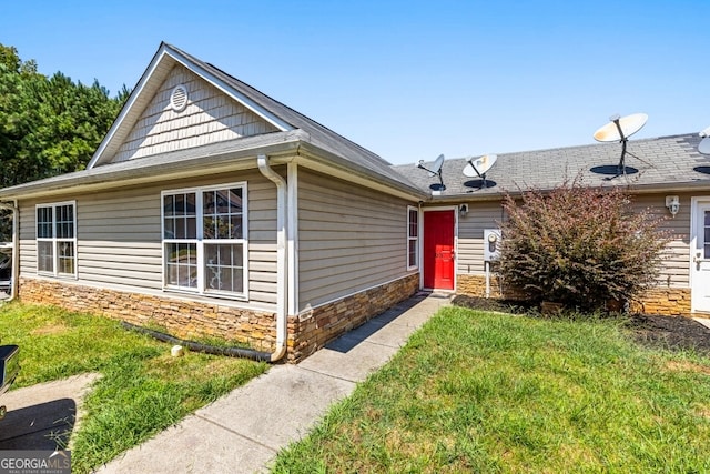 281 Northwinds Blvd Unit D-3, Carrollton, GA 30197 - view of front of home featuring stone siding and a front yard