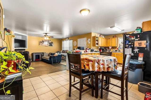 281 Northwinds Blvd Unit D-3, Carrollton, GA 30197 - dining room with light tile patterned floors and ceiling fan