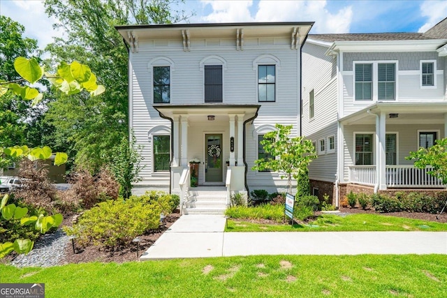 410 Anglin Walk, Alpharetta, GA 30009 - italianate house with a porch and a front lawn