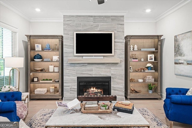 410 Anglin Walk, Alpharetta, GA 30009 - living room featuring wood finished floors, a tile fireplace, ornamental molding, and recessed lighting