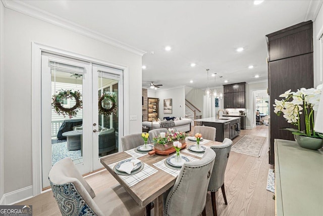 410 Anglin Walk, Alpharetta, GA 30009 - dining area with crown molding, light wood-type flooring, stairs, french doors, and recessed lighting