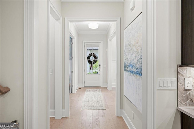 410 Anglin Walk, Alpharetta, GA 30009 - doorway with crown molding and light wood-style floors