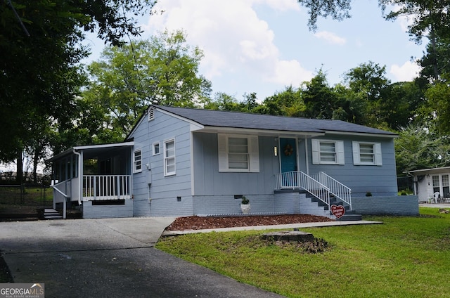 4447 Pharr Ave Unit 0, Macon, GA 31204 - view of front of property featuring crawl space, a front lawn, covered porch, and concrete driveway