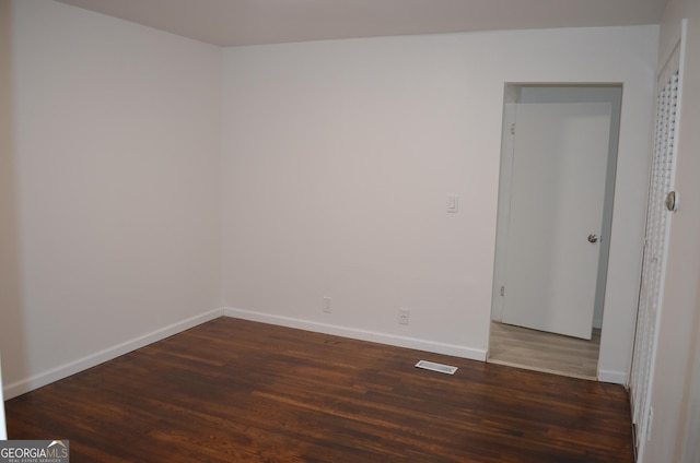 4447 Pharr Ave Unit 0, Macon, GA 31204 - empty room with wood finished floors and baseboards