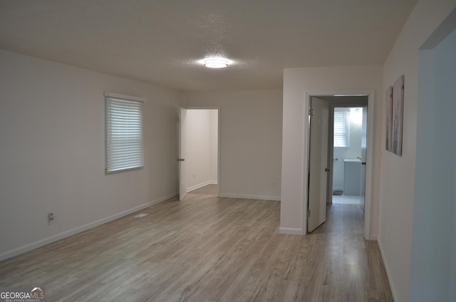 4447 Pharr Ave Unit 0, Macon, GA 31204 - spare room with light wood-type flooring and a textured ceiling