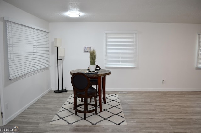 4447 Pharr Ave Unit 0, Macon, GA 31204 - dining area with light wood-type flooring and baseboards