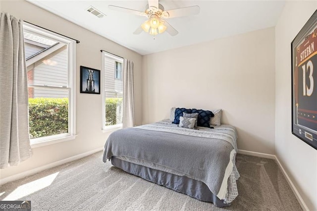 3072 Oaktree, Duluth, GA 30096 - bedroom featuring carpet, multiple windows, and a ceiling fan