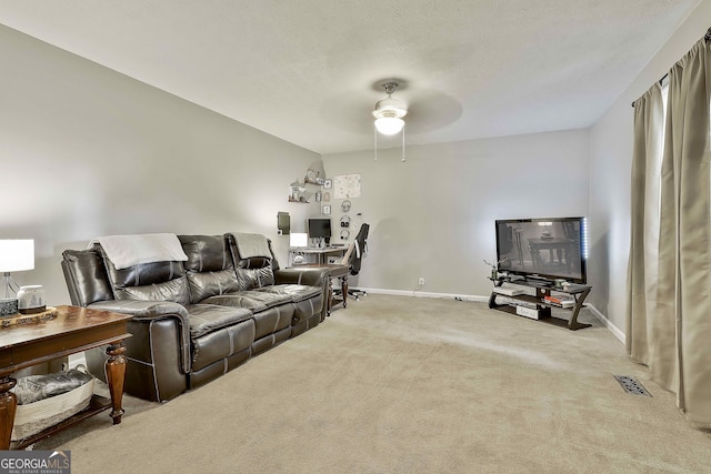 3453 Hogansville Rd, Lagrange, GA 30241 - carpeted living area featuring ceiling fan and baseboards