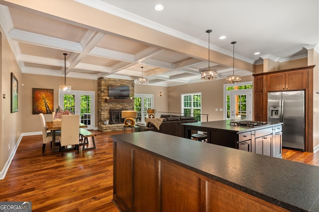 112 Springhill Ln, Clarkesville, GA 30523 - kitchen with appliances with stainless steel finishes, dark countertops, dark wood-style floors, french doors, and beam ceiling
