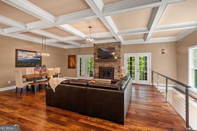 112 Springhill Ln, Clarkesville, GA 30523 - living area with a chandelier, a fireplace, dark wood-type flooring, coffered ceiling, and beamed ceiling