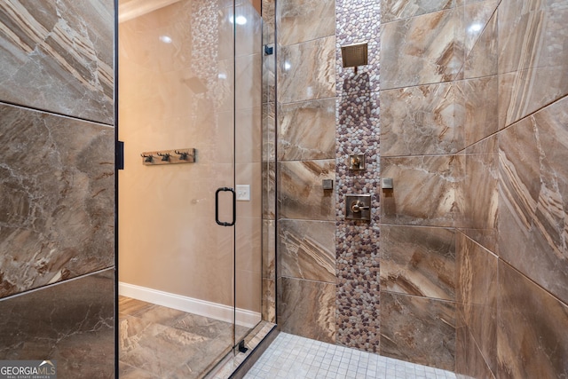 112 Springhill Ln, Clarkesville, GA 30523 - bathroom with a shower stall and marble finish floors