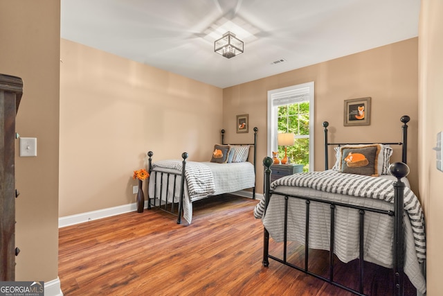112 Springhill Ln, Clarkesville, GA 30523 - bedroom featuring wood finished floors and baseboards