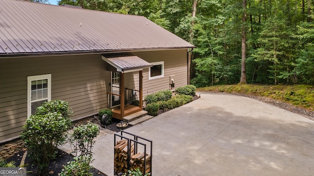 112 Springhill Ln, Clarkesville, GA 30523 - view of side of property featuring a patio and a metal roof