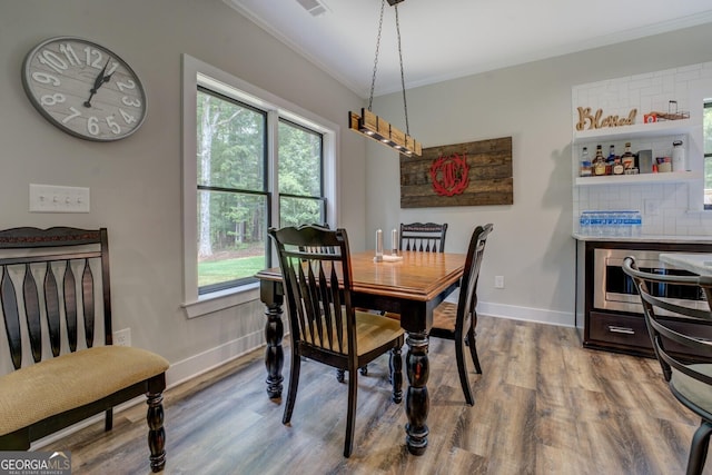 2591 Reids Ferry Rd, Buckhead, GA 30625 - dining room with ornamental molding, plenty of natural light, and wood finished floors