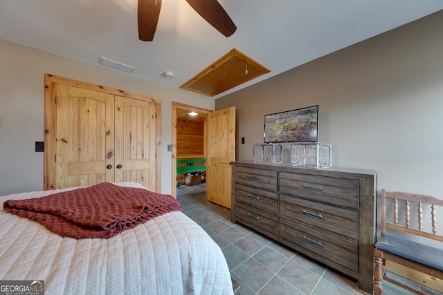 335 Jones Rd, Jefferson, GA 30549 - tiled bedroom featuring attic access and ceiling fan