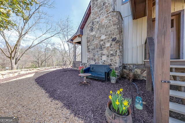 335 Jones Rd, Jefferson, GA 30549 - view of property exterior featuring stone siding and board and batten siding