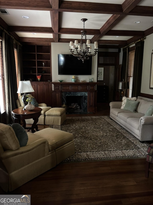 320 E 3rd Ave, Rome, GA 30161 - living room featuring coffered ceiling, a chandelier, wood finished floors, beamed ceiling, and built in shelves