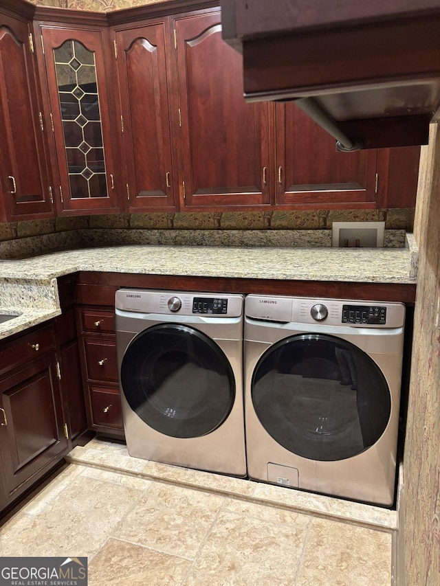 320 E 3rd Ave, Rome, GA 30161 - laundry room with cabinet space and washing machine and dryer
