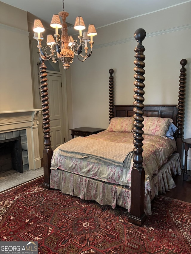 320 E 3rd Ave, Rome, GA 30161 - bedroom featuring a chandelier and a fireplace