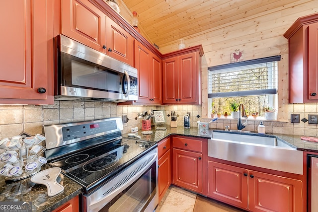 339 Jones Rd, Jefferson, GA 30549 - kitchen featuring appliances with stainless steel finishes, tasteful backsplash, dark brown cabinets, and wood ceiling