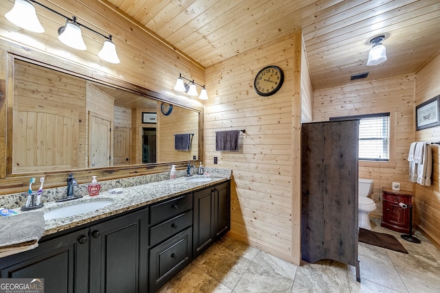 339 Jones Rd, Jefferson, GA 30549 - full bathroom featuring wood walls, double vanity, and wooden ceiling