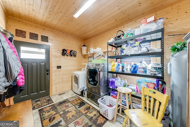 339 Jones Rd, Jefferson, GA 30549 - laundry area with washing machine and clothes dryer, wood walls, and wood ceiling