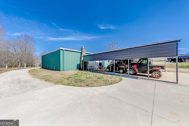 339 Jones Rd, Jefferson, GA 30549 - view of property featuring a detached carport and driveway