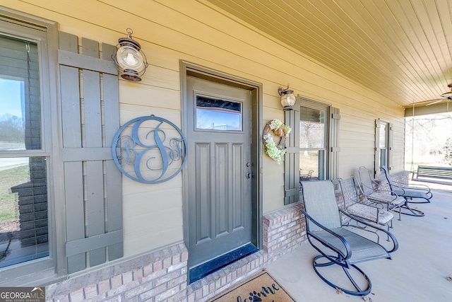 339 Jones Rd, Jefferson, GA 30549 - view of exterior entry featuring covered porch and brick siding