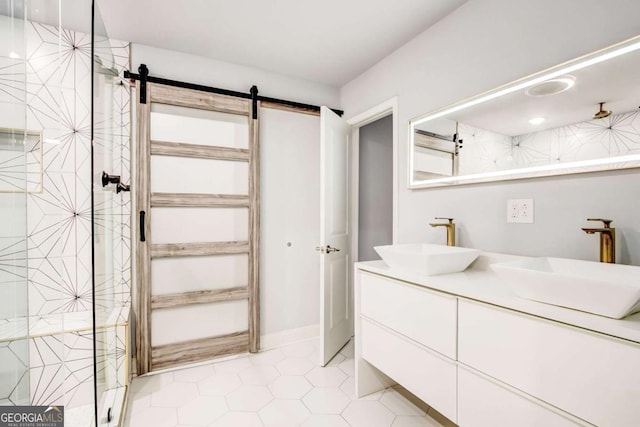 2200 Glendale Dr, Atlanta, GA 30032 - bathroom featuring double vanity, tile patterned flooring, and a shower with door