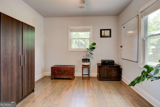 2200 Glendale Dr, Atlanta, GA 30032 - sitting room with light wood-style floors and healthy amount of natural light