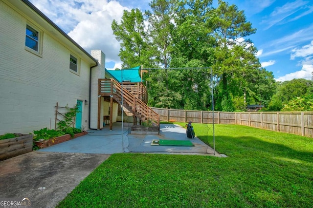 2200 Glendale Dr, Atlanta, GA 30032 - fenced backyard featuring a patio area, stairs, and a wooden deck
