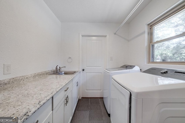 281 Noel C Conaway Rd, Guyton, GA 31312 - laundry room with washing machine and dryer and cabinet space