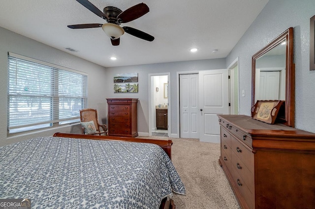 281 Noel C Conaway Rd, Guyton, GA 31312 - bedroom featuring light carpet, a ceiling fan, connected bathroom, and recessed lighting