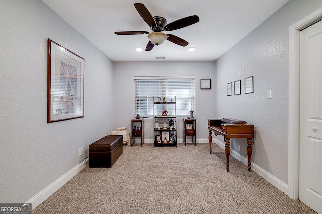 281 Noel C Conaway Rd, Guyton, GA 31312 - home office with a ceiling fan, light colored carpet, and a textured wall