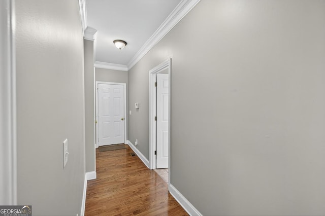 103 W Second St, Greensboro, GA 30642 - corridor featuring crown molding and wood finished floors