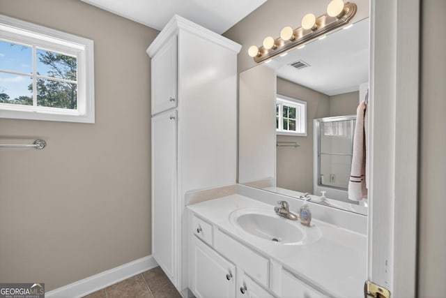 103 W Second St, Greensboro, GA 30642 - full bathroom featuring vanity, an enclosed shower, and tile patterned flooring