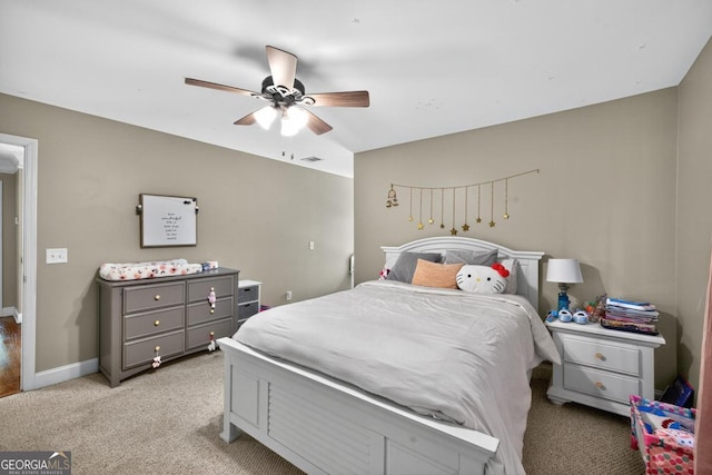 103 W Second St, Greensboro, GA 30642 - bedroom featuring light colored carpet and a ceiling fan