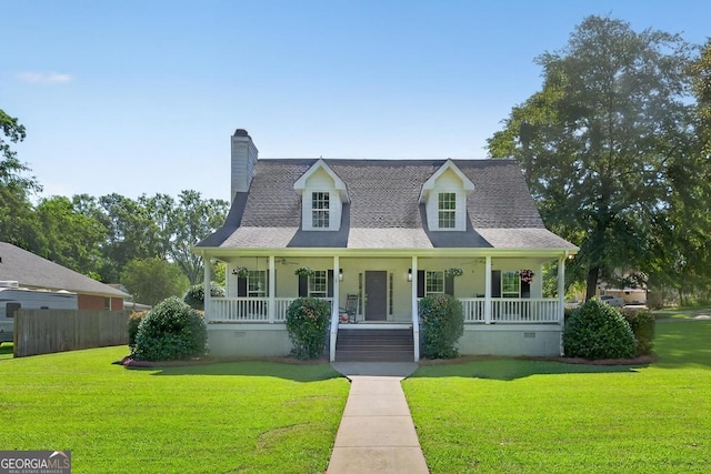 103 W Second St, Greensboro, GA 30642 - cape cod-style house with a porch, a chimney, and a shingled roof