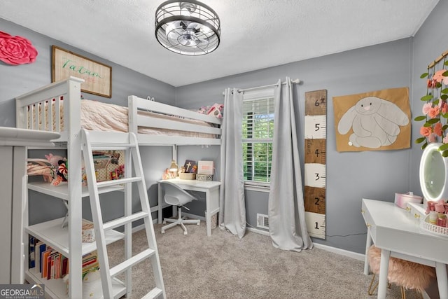 1724 Cedar Grove Church Rd, Winder, GA 30680 - bedroom with carpet, a textured ceiling, and a desk