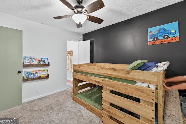 1724 Cedar Grove Church Rd, Winder, GA 30680 - carpeted bedroom featuring a textured ceiling and a ceiling fan