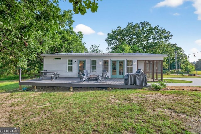 1724 Cedar Grove Church Rd, Winder, GA 30680 - back of house with a deck, a yard, french doors, and a sunroom