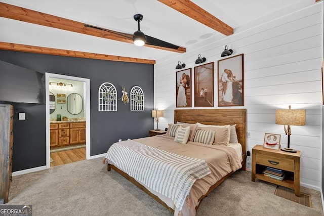 1724 Cedar Grove Church Rd, Winder, GA 30680 - bedroom featuring carpet flooring, beam ceiling, ensuite bathroom, wood walls, and ceiling fan