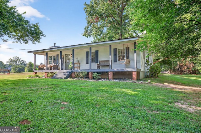 1724 Cedar Grove Church Rd, Winder, GA 30680 - view of front of home with a porch and a front lawn